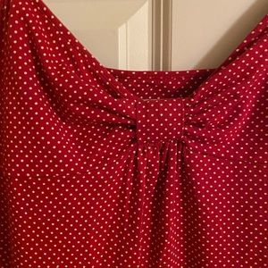 A babydoll polka dress in red